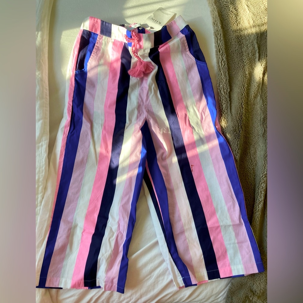 This colorful striped pants are from M&S kids.